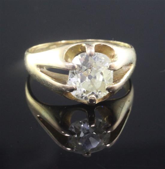 An 18ct gold and claw set solitaire diamond ring, size P.